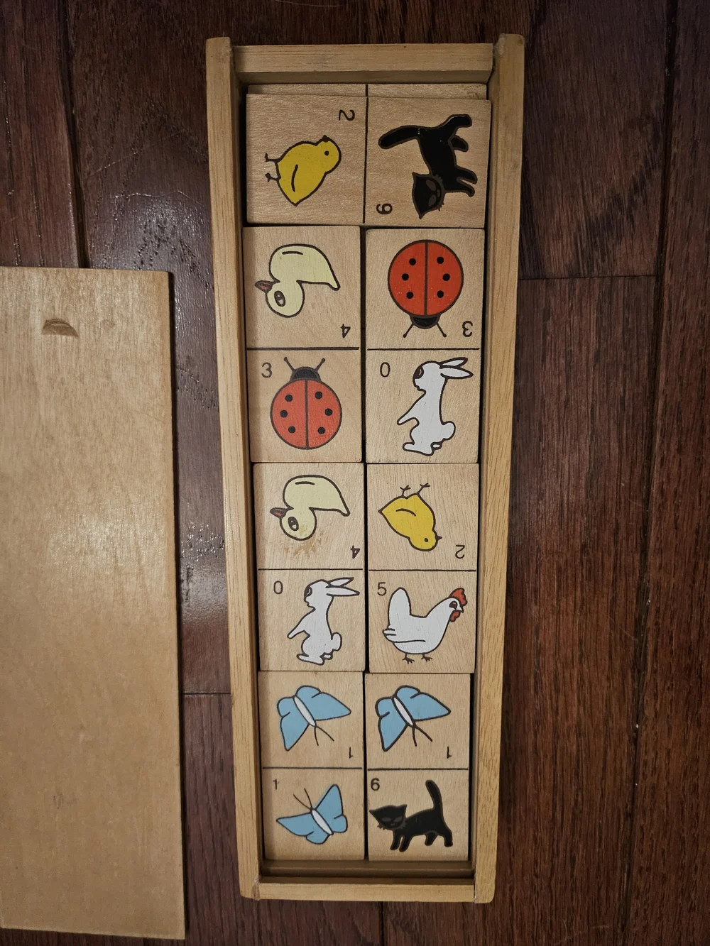 Vtg wooden animal dominoes stored in wooden sliding box